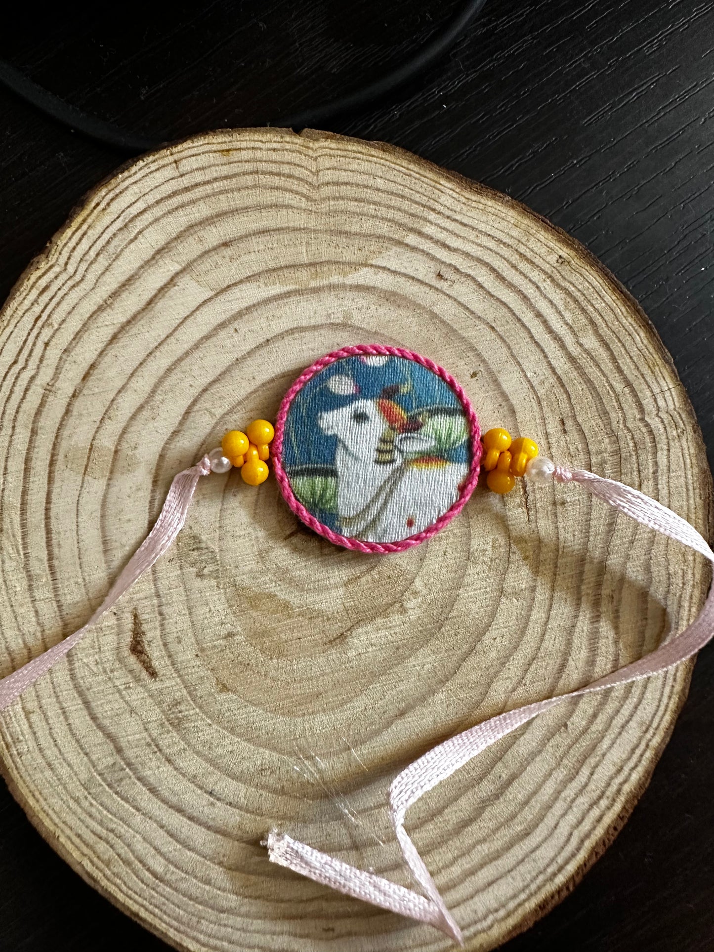 Pichwai Pink Cow Rakhi