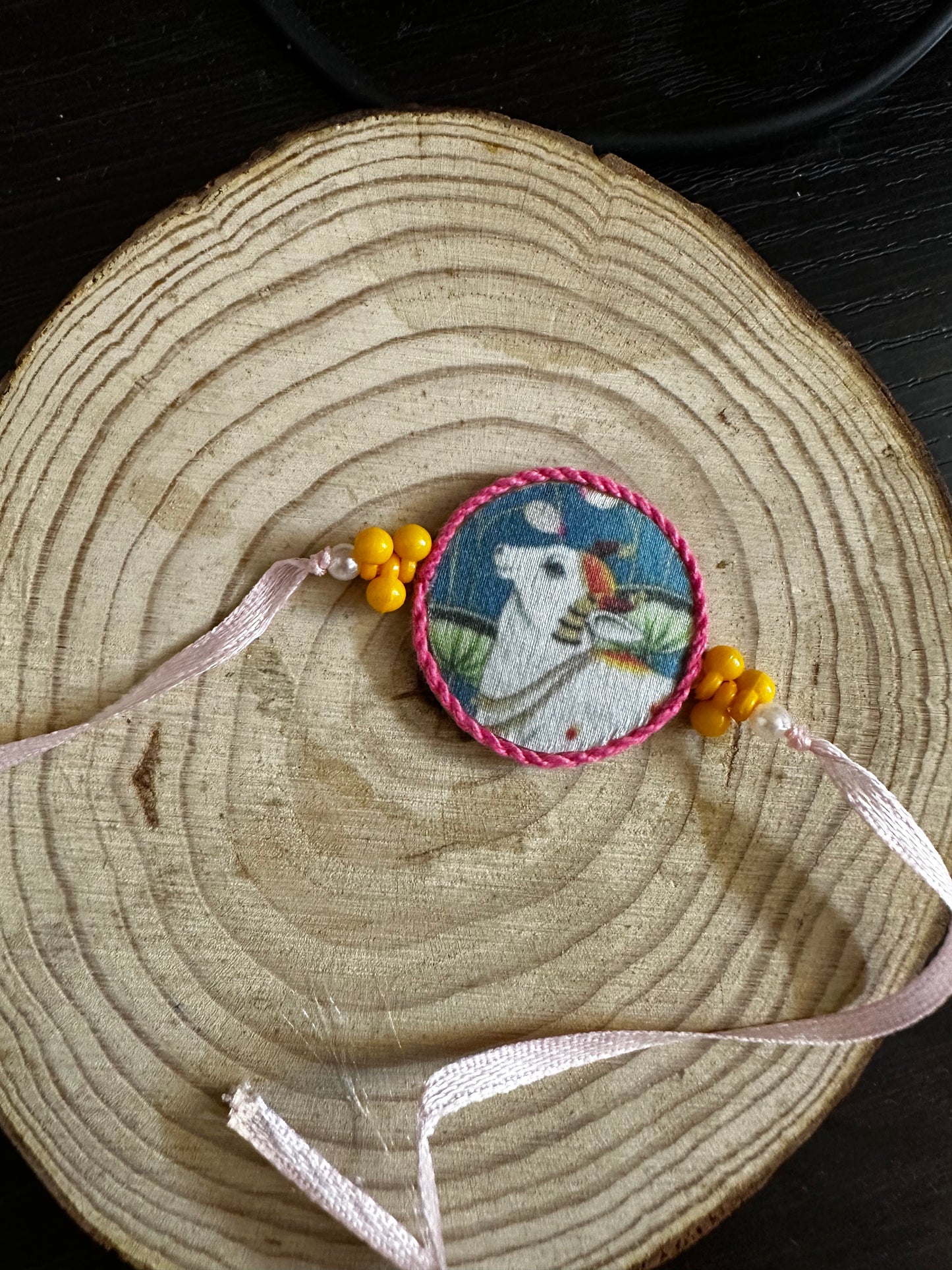 Pichwai Pink Cow Rakhi