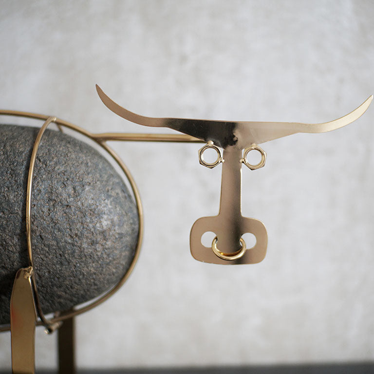 BULLS EYE METAL AND RESIN ARTIFACTS