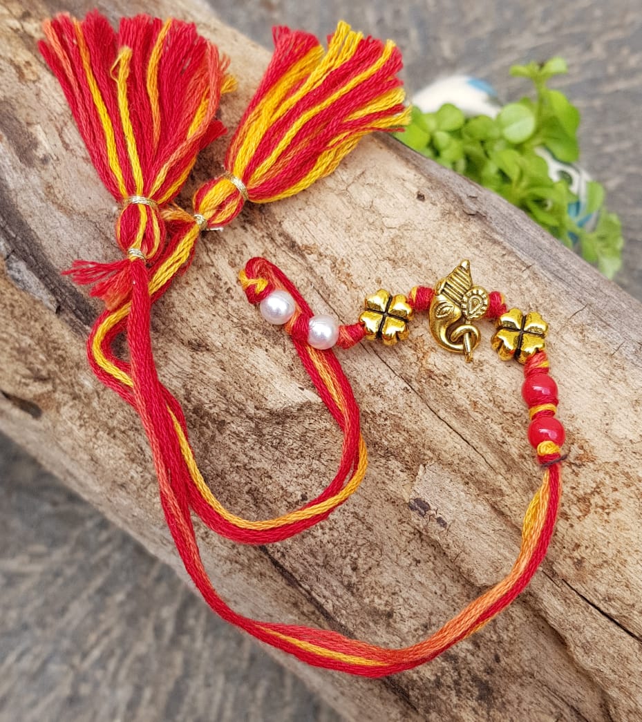 Golden Metal Ganesh Rakhi