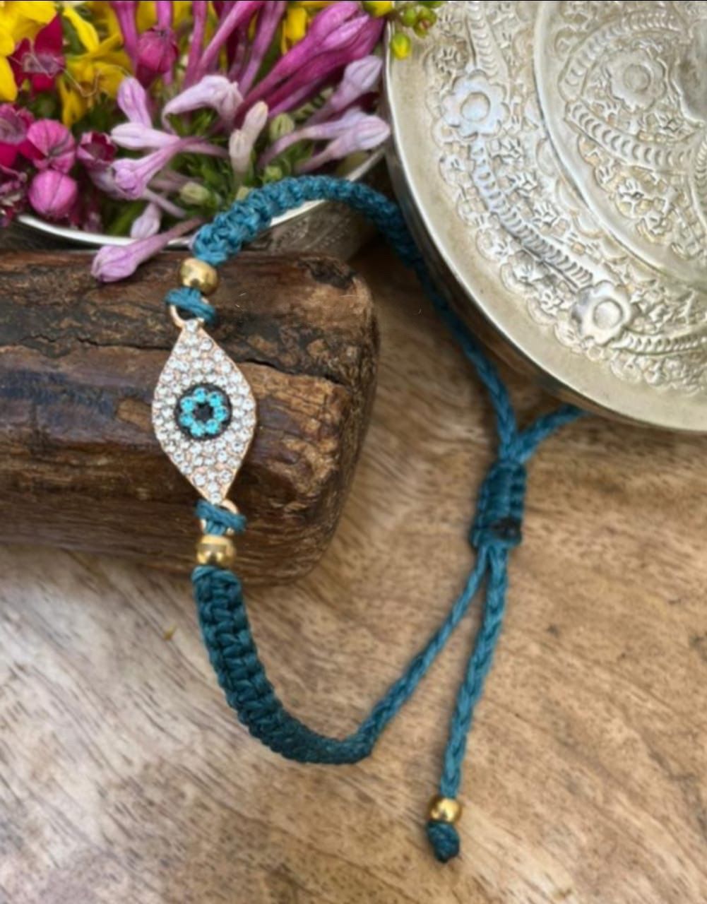 Studded eye rakhi