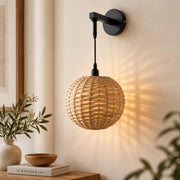 Handwoven Round Rattan Wall Light with Adjustable Drop Rod | Natural Wicker Wall Lamp | Matte Black Metal Arm