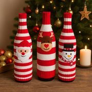 Coral Tree Christmas Wine Bottle Covers Set of 3 – Santa, Reindeer & Snowman Design | Red & White Striped Knitted Decoration Sleeves | 27 cm Height × 10 cm Width | Soft Acrylic Material | Festive Table & Gift Décor
