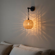 Handwoven Round Rattan Wall Light with Adjustable Drop Rod | Natural Wicker Wall Lamp | Matte Black Metal Arm