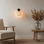 Handwoven Rattan Wall Lamp with Black Metal Arm | Warm Ambient Wall Light | Natural Boho Decor | H25 x D25 x W22 cm