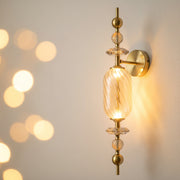 Luxury Amber Glass Integrated LED Wall Light with Crystal Accents – Antique Brass Finish