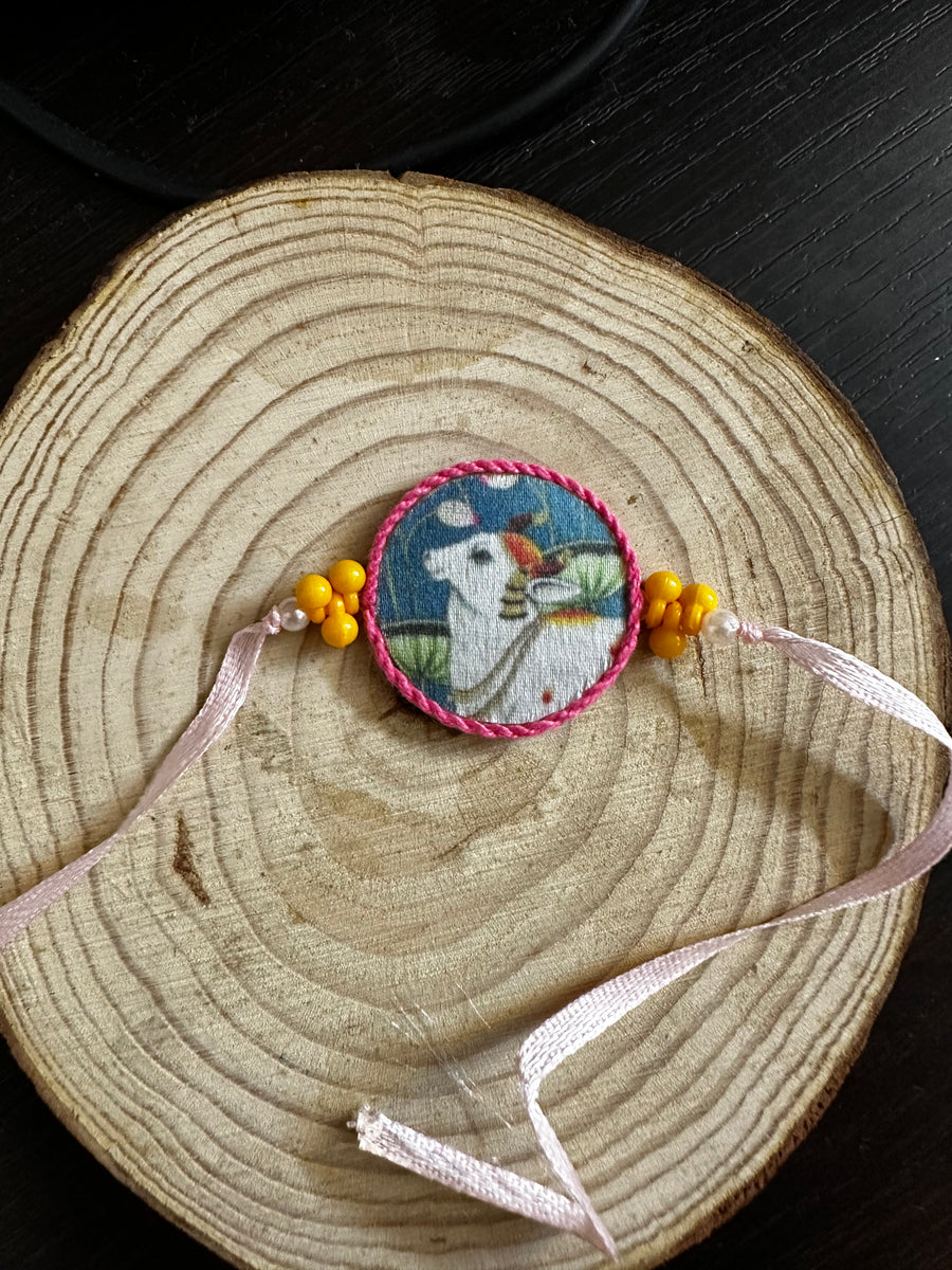 Pichwai Pink Cow Rakhi