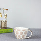 Geometric Print Ceramic Coffee Mug With Golden Handle